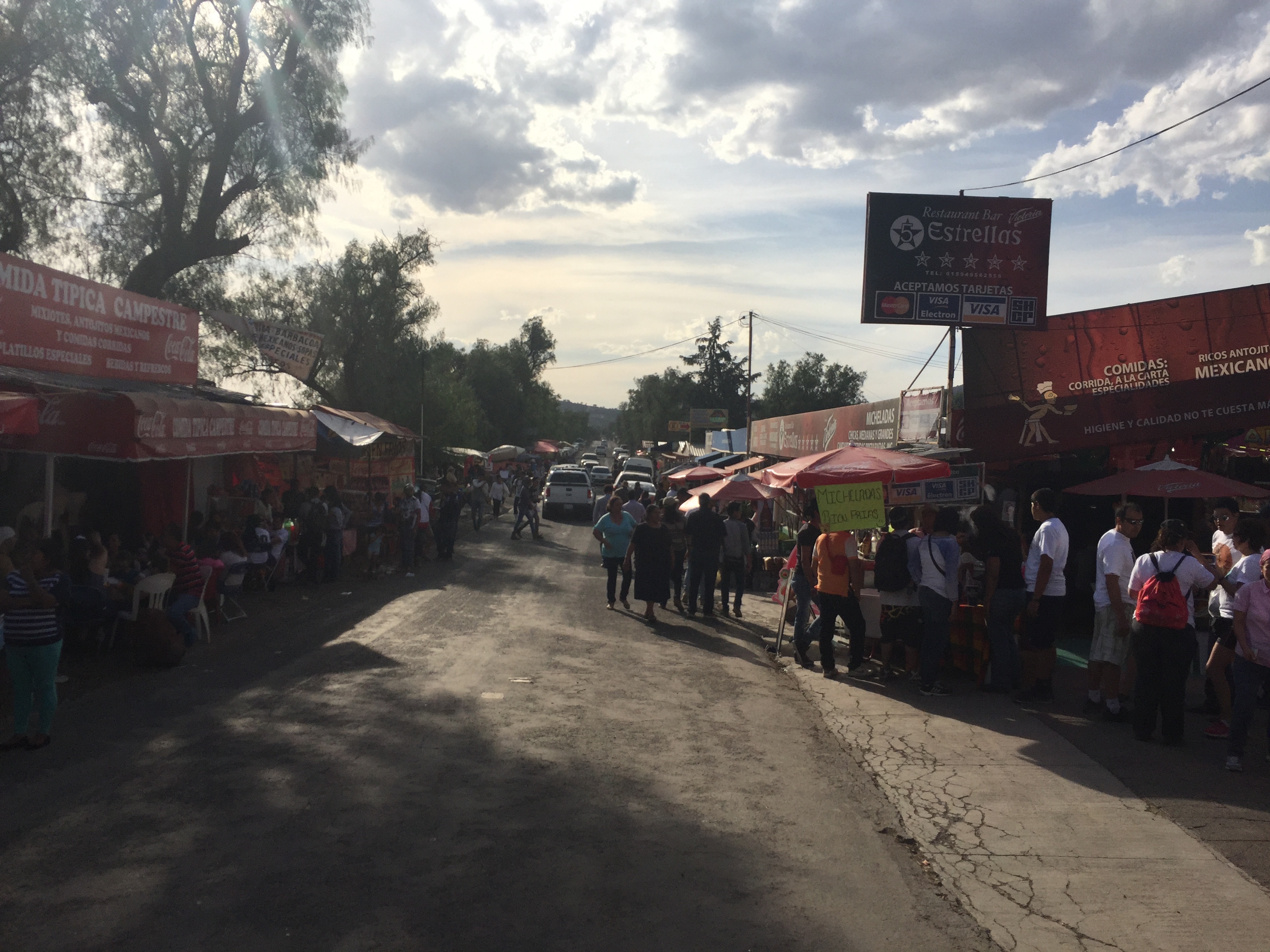 People eat at food carts in Teotihuacan, Mexico.