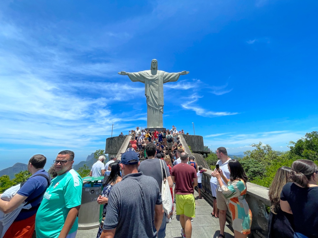 Tourists gather around Cristo Redentor in Rio de Janeiro.